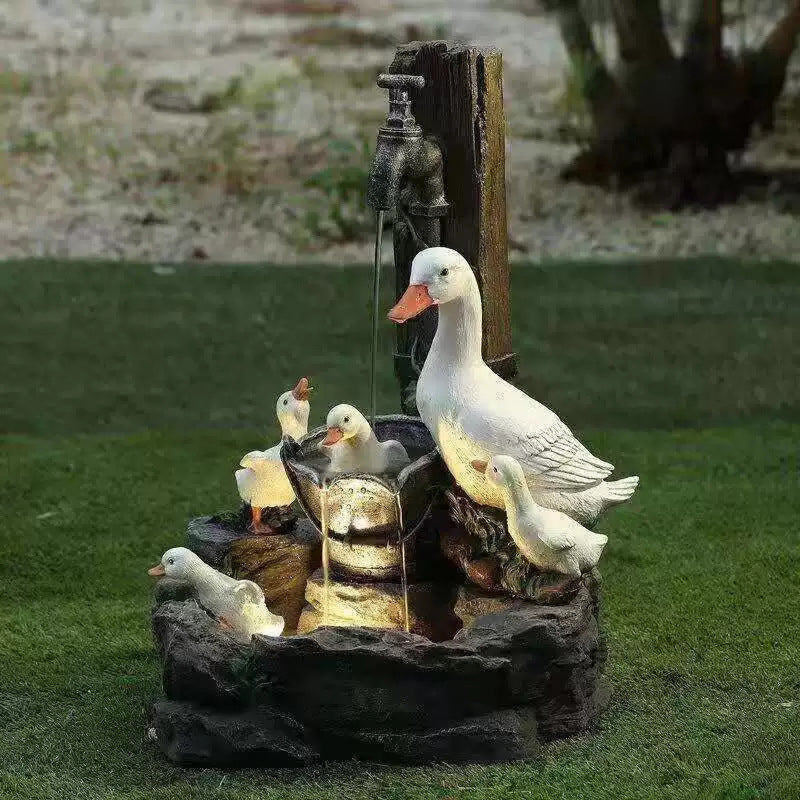 Solar resin duck garden fountain with LED squirrel design